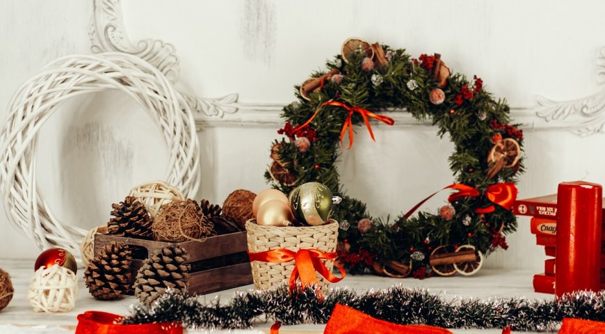 Pine Cones and Christmas Wreaths Placed on White Table Photo by Irina Iriser from Pexels